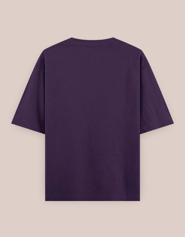Purple t-shirt on a beige background