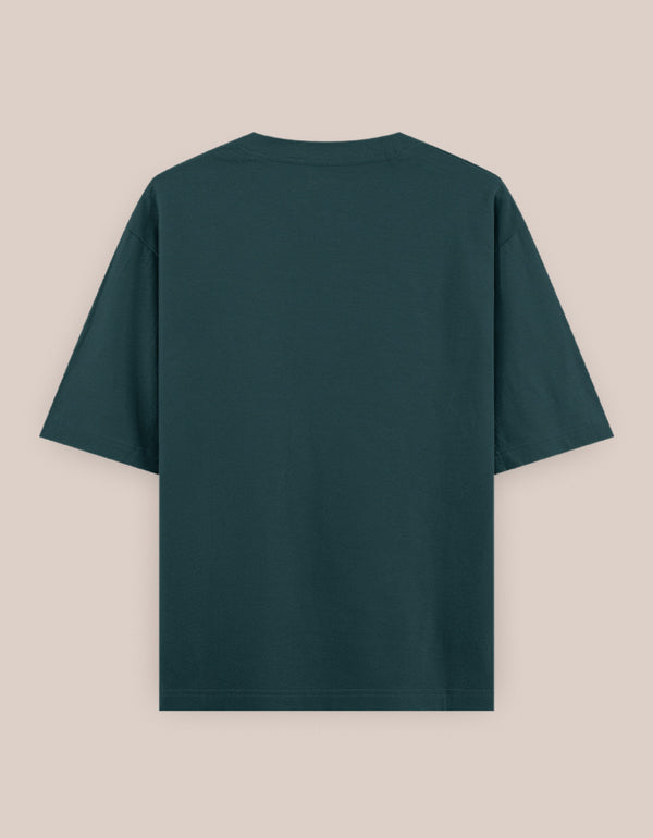 Green t-shirt on a beige background