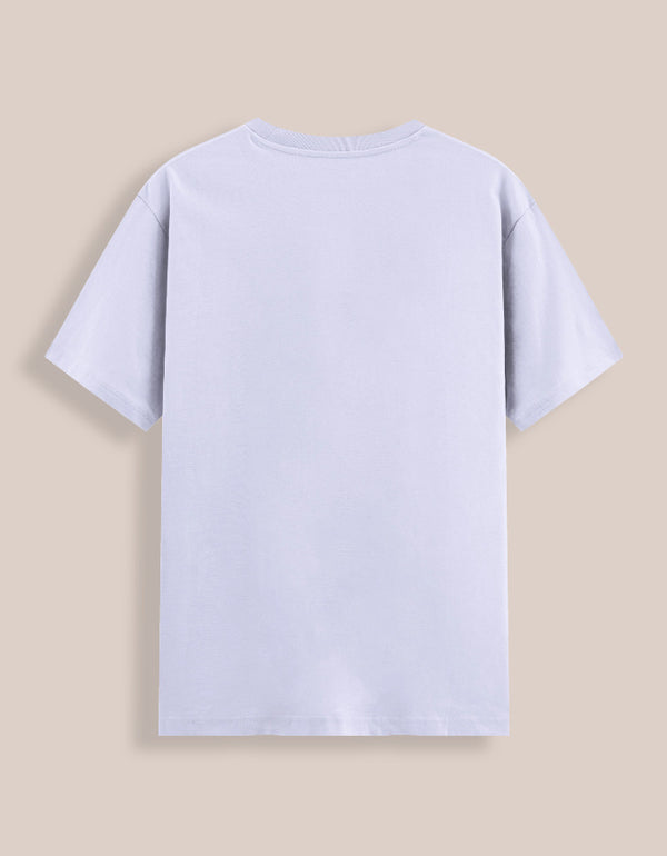 Light blue t-shirt on a beige background