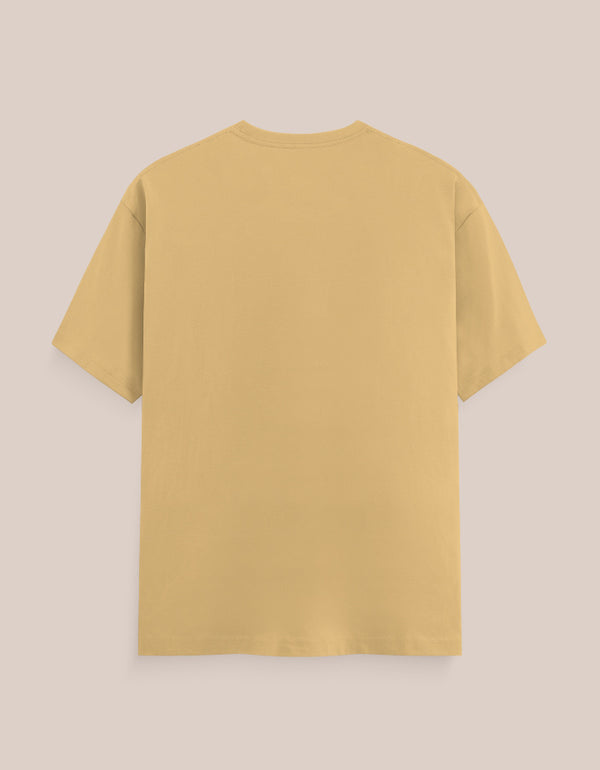 Yellow t-shirt on a beige background