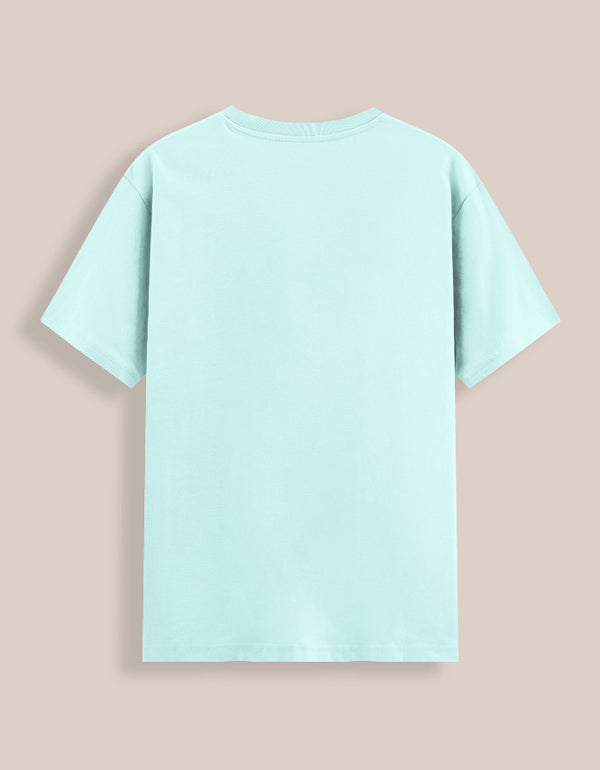 Light blue t-shirt on a beige background