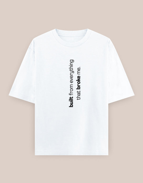 White t-shirt with black text on a beige background