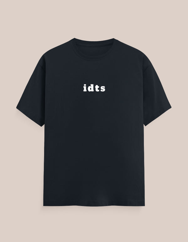 Black t-shirt with 'idts' text on a beige background