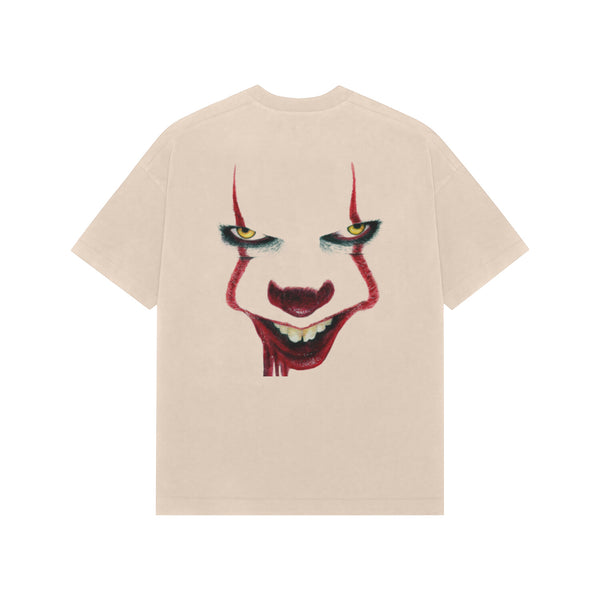 Embrace the madness with this Joker-inspired clown face t-shirt. A darkly humorous design for those who appreciate the villain's twisted charm. Get yours and make a statement!