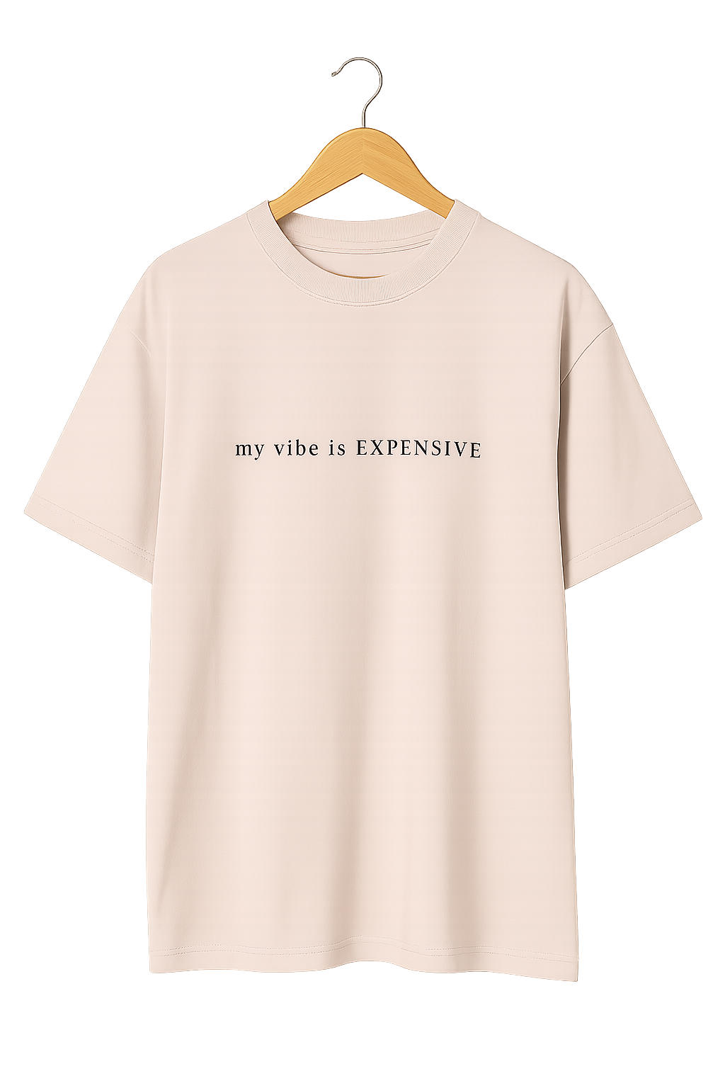 Beige t-shirt with 'my vibe is EXPENSIVE' text on a hanger against a white background